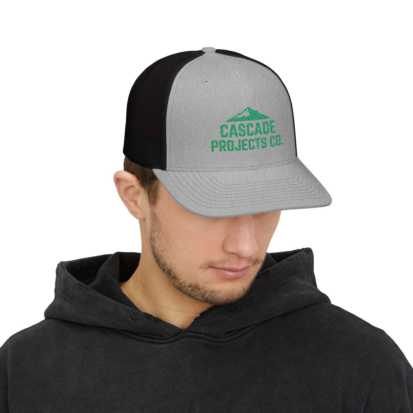 Embroidered Trucker Cap — Cascade Projects Co. Mountain Logo