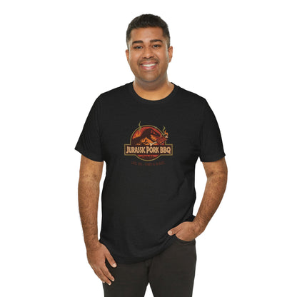 Jurassic Pork BBQ T-Shirt — Funny Dino Grilling Tee ("Jurassic Pork BBQ")