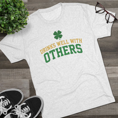 St. Patrick's Day 'Drinks Well With Others' Crew Tee — Shamrock Pub Party Shirt OddInk Seasonal Designs