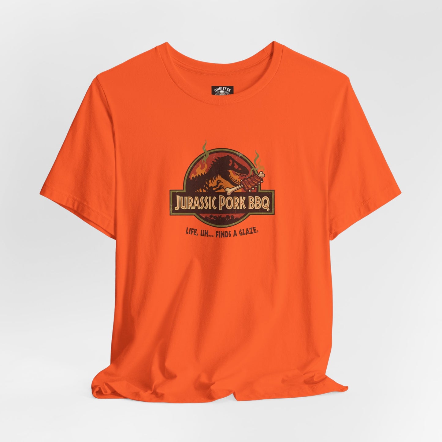 Jurassic Pork BBQ T-Shirt — Funny Dino Grilling Tee ("Jurassic Pork BBQ")