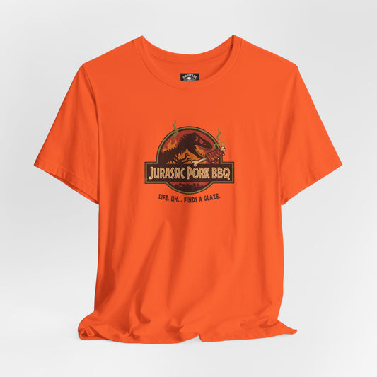 Jurassic Pork BBQ T-Shirt — Funny Dino Grilling Tee ("Jurassic Pork BBQ")