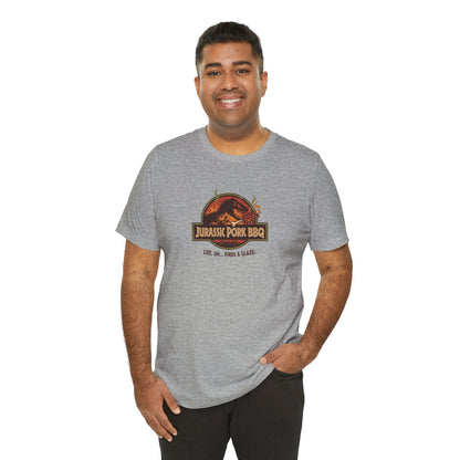 Jurassic Pork BBQ T-Shirt — Funny Dino Grilling Tee ("Jurassic Pork BBQ")