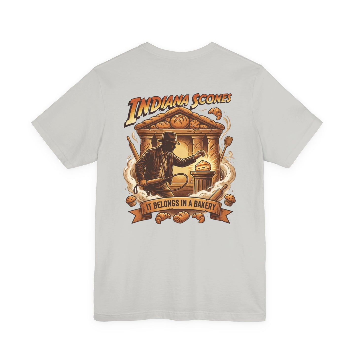 Indiana Scones Bakery Pop-Parody T‑Shirt — "It Belongs in a Bakery" Vintage 80's Adventure Bakery Tee