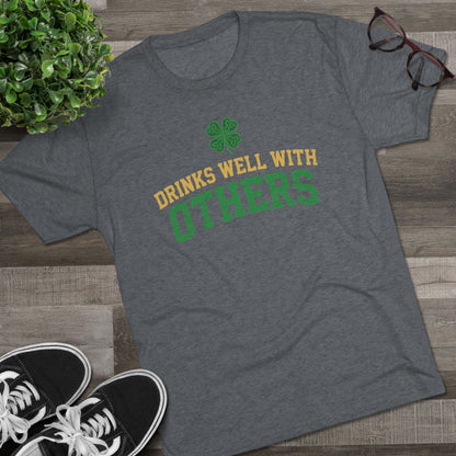 St. Patrick's Day 'Drinks Well With Others' Crew Tee — Shamrock Pub Party Shirt OddInk Seasonal Designs