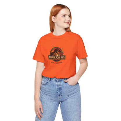 Jurassic Pork BBQ T-Shirt — Funny Dino Grilling Tee ("Jurassic Pork BBQ")