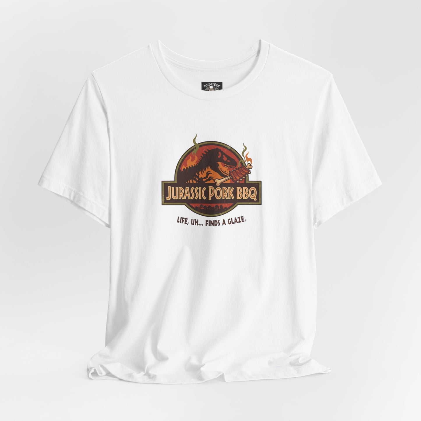 Jurassic Pork BBQ T-Shirt — Funny Dino Grilling Tee ("Jurassic Pork BBQ")