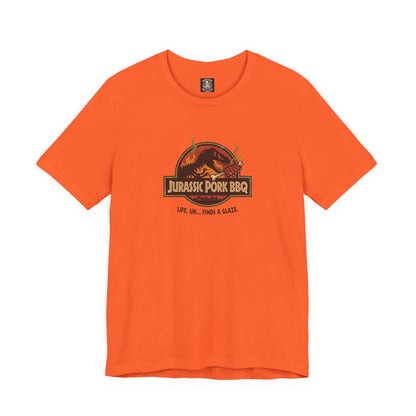 Jurassic Pork BBQ T-Shirt — Funny Dino Grilling Tee ("Jurassic Pork BBQ")