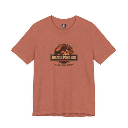 Jurassic Pork BBQ T-Shirt — Funny Dino Grilling Tee ("Jurassic Pork BBQ")